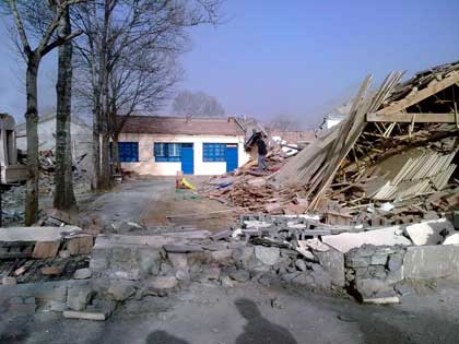 Collapsed dormitory buildings at Yushu Medical School